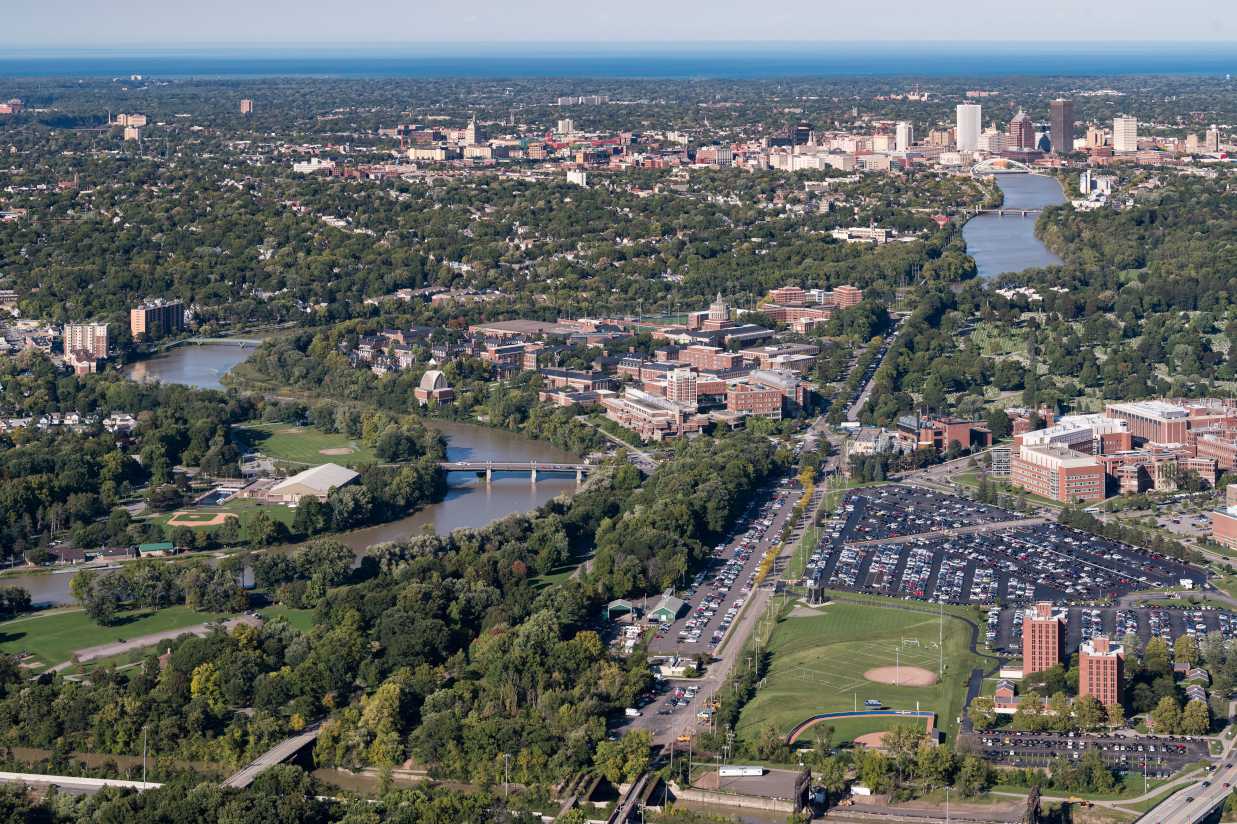 University of Rochester's River Campus, Medical Center and downtown Rochester are seen alongside the Genesee River in an aerial view