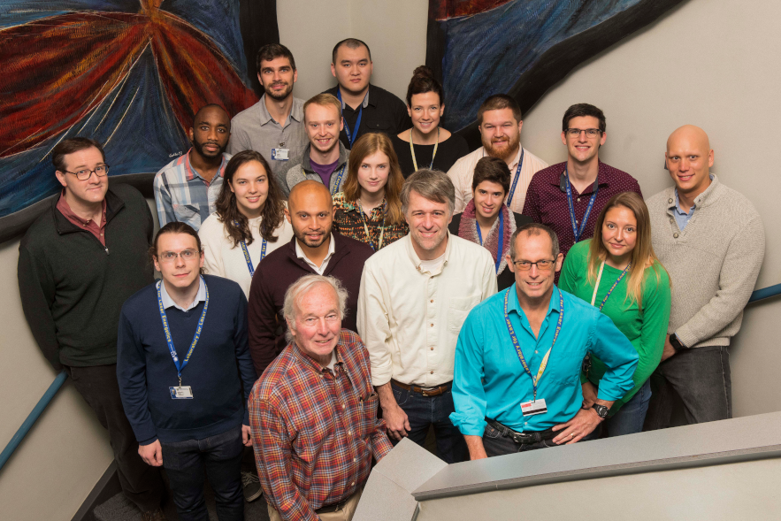 Group of scientists smiling